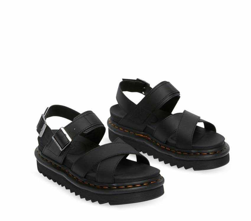 A pair of Dr Martens Voss II Black Hydro Leather Sandals with gunmetal buckles on a white background.
