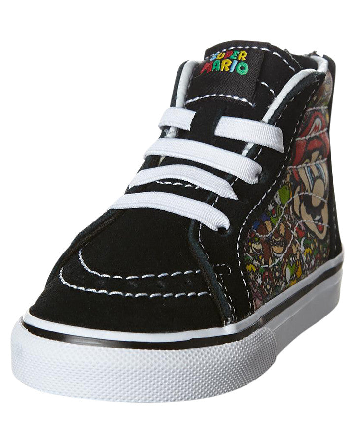 Vans Infants SK8-Hi Zip limited edition sneakers featuring Mario and Luigi from Nintendo. The sneakers are black with character illustrations on the side.