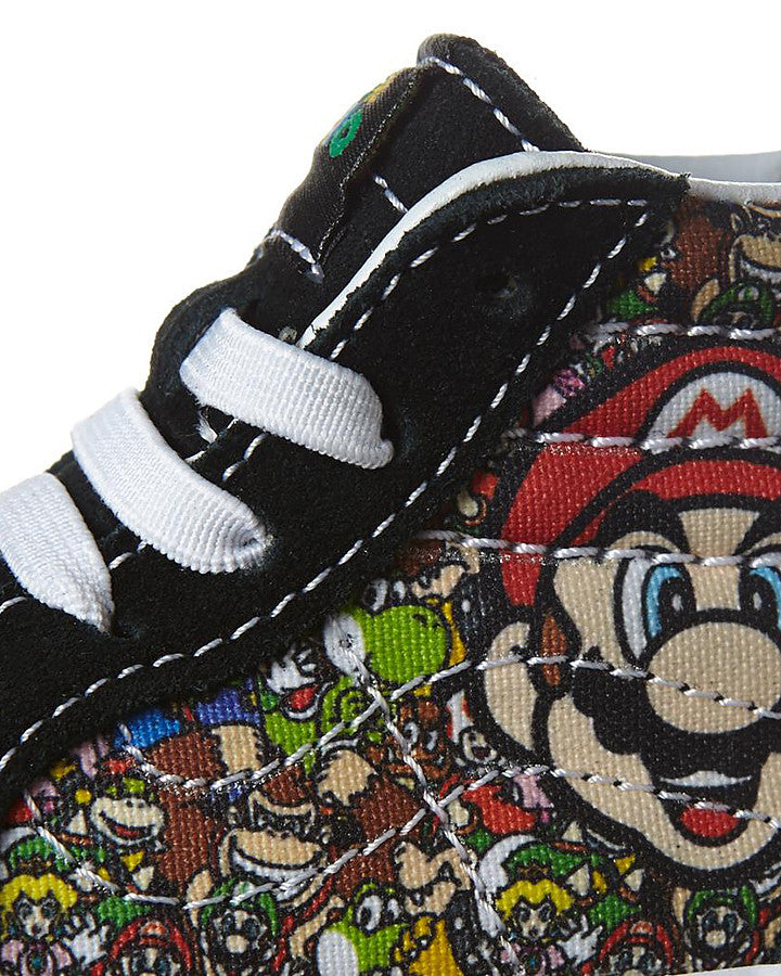 Vans Infants SK8-Hi Zip limited edition sneakers featuring Mario and Luigi from Nintendo. The sneakers are black with character illustrations on the side.
