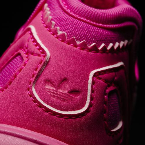 Adidas Originals Infants Tubular Runner Hot Pink S78720 Tubular Runner Shoes These infants' shoes build on the legacy of the 1993 Tubular runner, re-creating it as a modern street-style sneaker. The infants' version of the Tubular shoe has the same progressive style as the grown-up pair, with a higher-cut bootee Famous Rock Shop. 517 Hunter Street Newcastle, 2300 NSW Australia