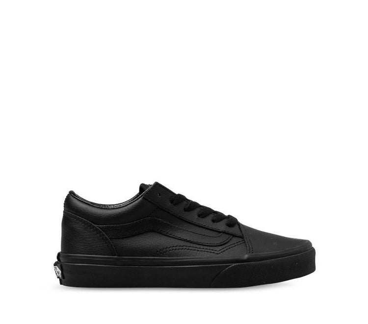 A pair of Vans Youth Old Skool leather sneakers in black color, displayed from two different angles showing the front and side profiles.