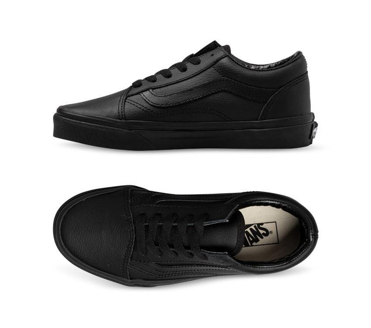 A pair of Vans Youth Old Skool leather sneakers in black color, displayed from two different angles showing the front and side profiles.