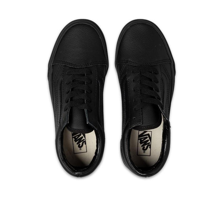A pair of Vans Youth Old Skool leather sneakers in black color, displayed from two different angles showing the front and side profiles.