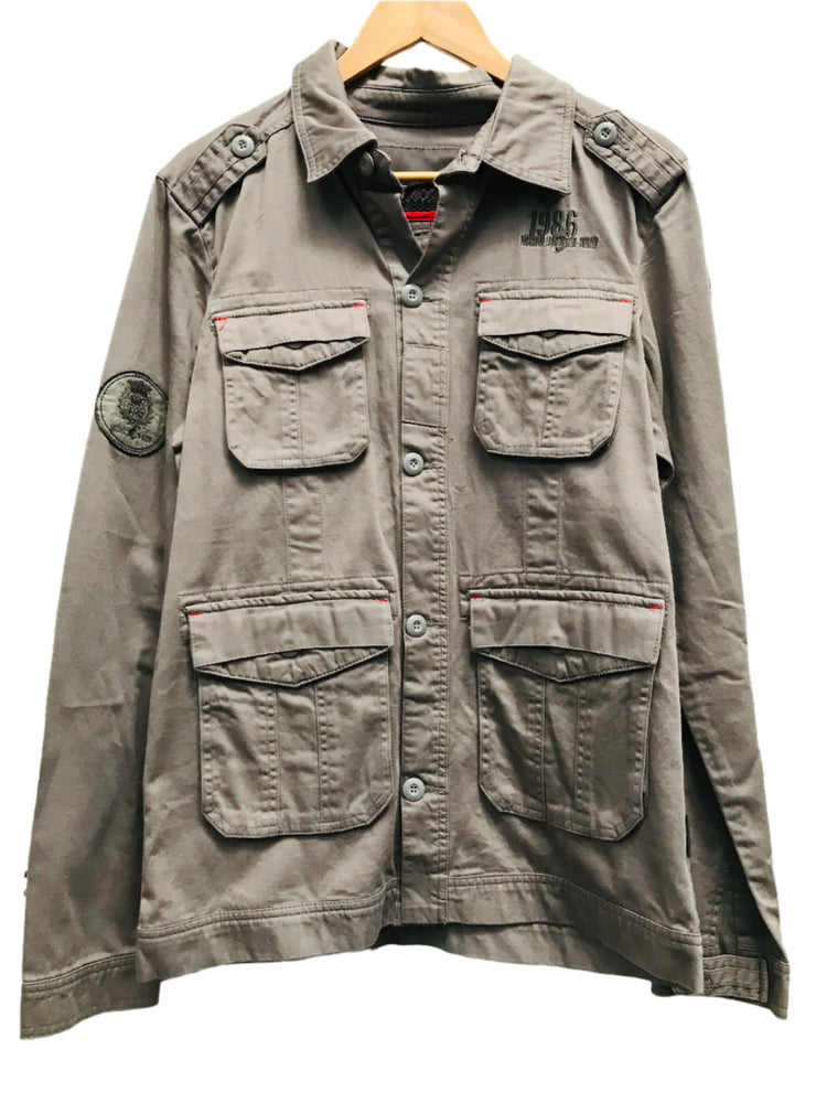 A mineral grey Mossimo military jacket with multiple pockets, displayed on a hanger.