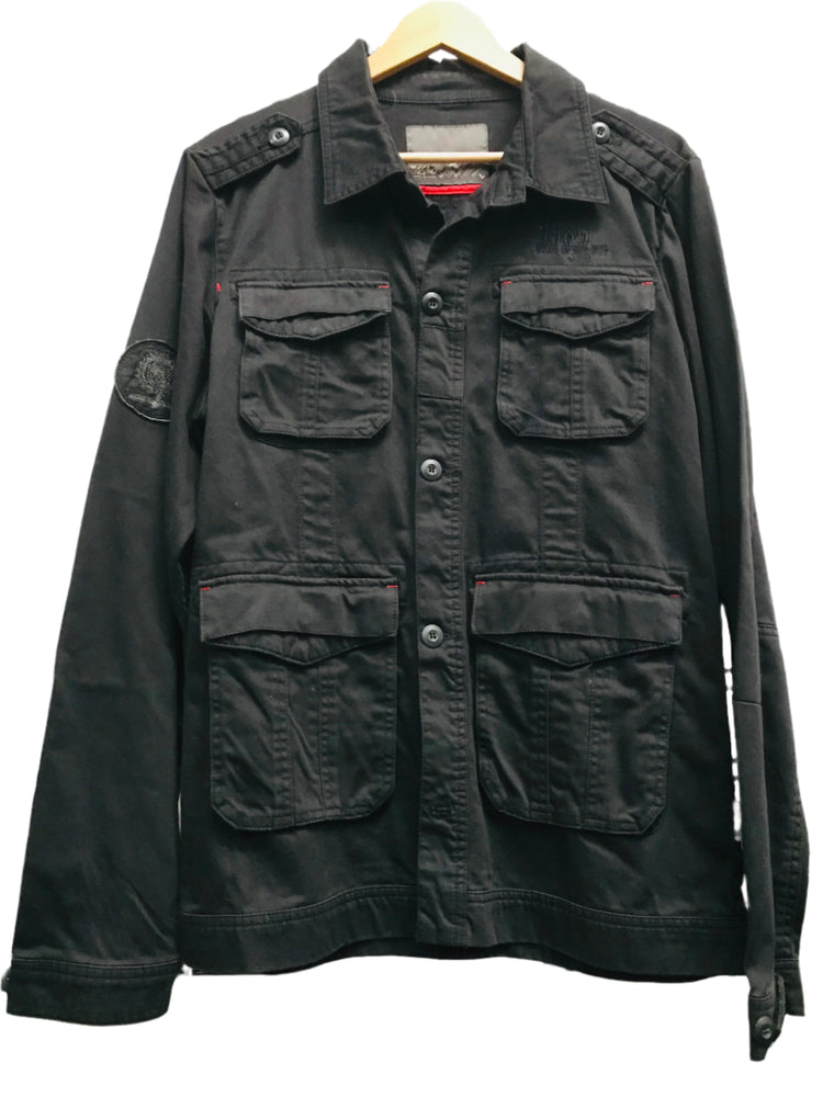 A black Mossimo military jacket displayed on a mannequin, featuring multiple pockets and button closures.